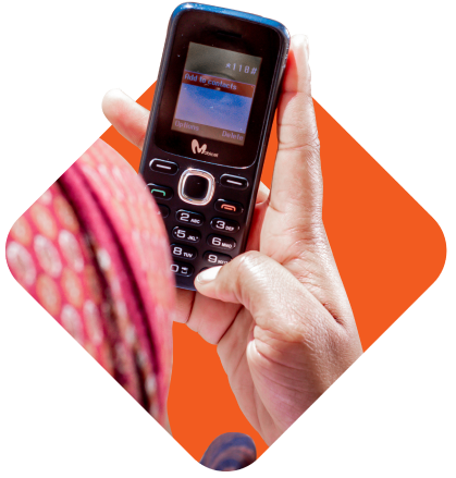 woman using phone in orange background